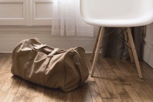 duffel bag on the house floor